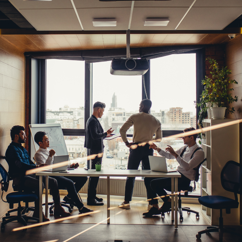 Group Digital Transformation Consulting session working together on a project.